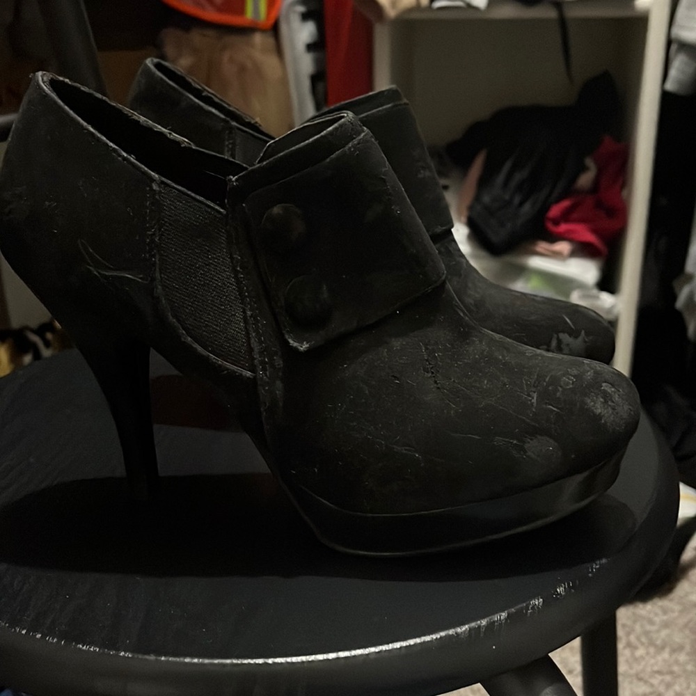 Black boots heels worn before